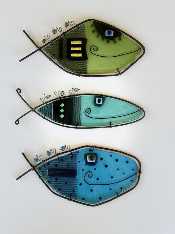 Three fused glass fish sculptures by Jerry Harty